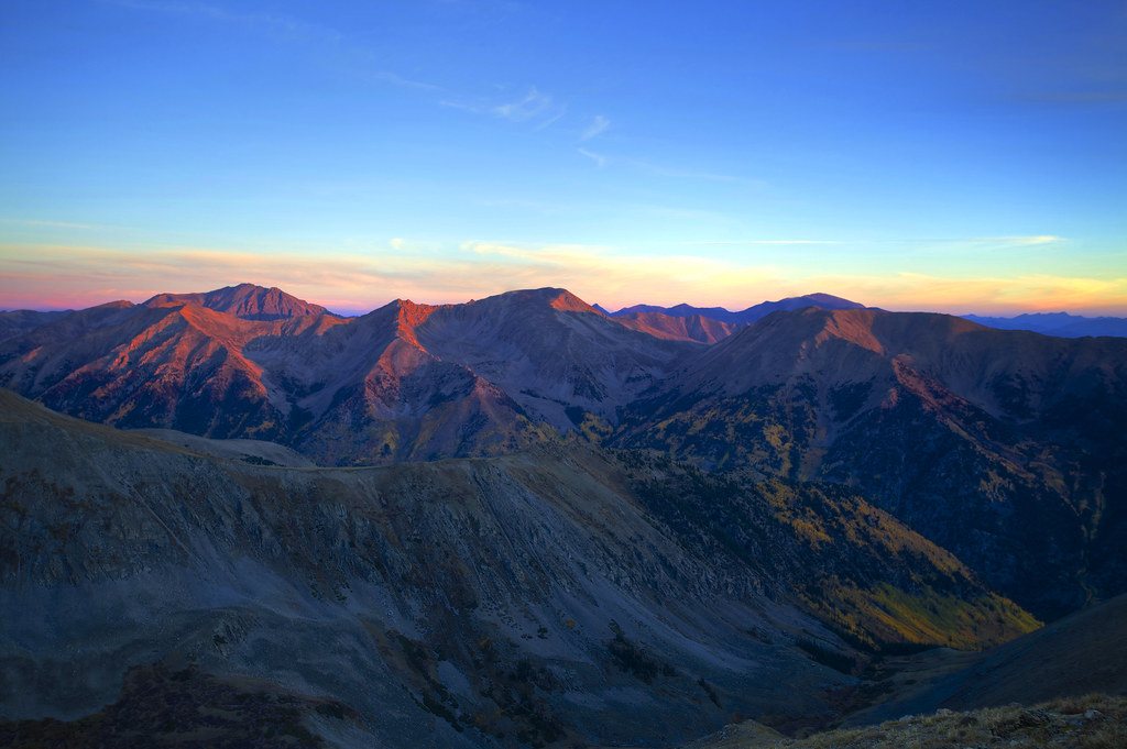 Sunrise lighting up the peaks of the Colorado Rocky Mountains